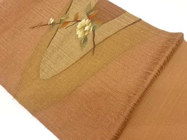 手織り紬すくい織曲線に椿模様織出し名古屋帯